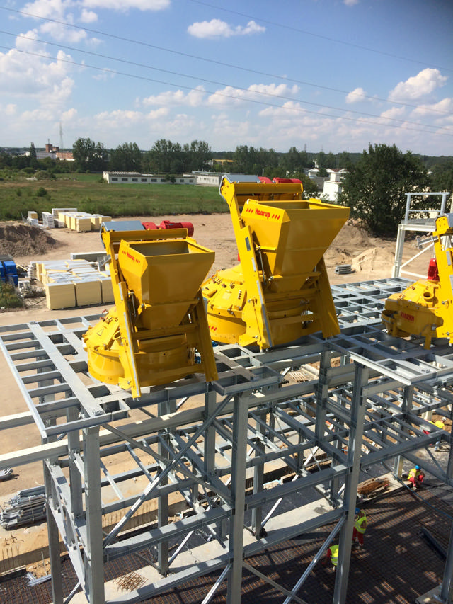 Three face-mix mixers placed on a robust steel construction.