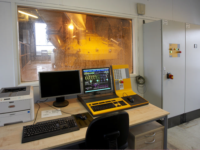 Mixo 3000 in the control room with window to a concrete mixer.