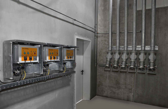 Silo Control System positioned on a wall in a concrete producing factory.