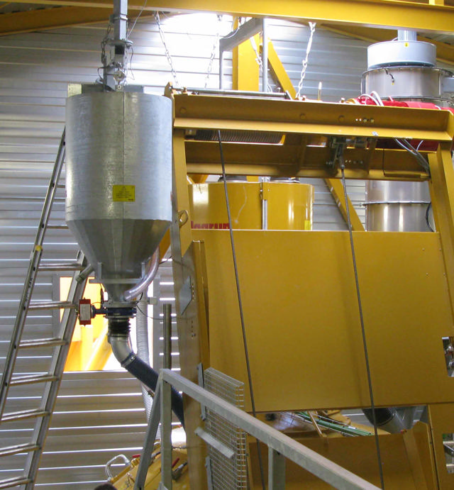 Water weigh hopper shown in a concrete producing facility.