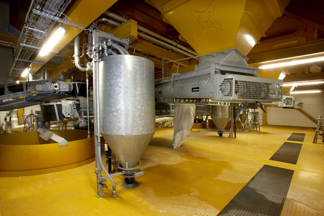 Water weigh hopper shown in a concrete producing facility.